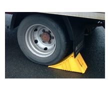 Cale d'immobilisation pour camions et semi-remorques